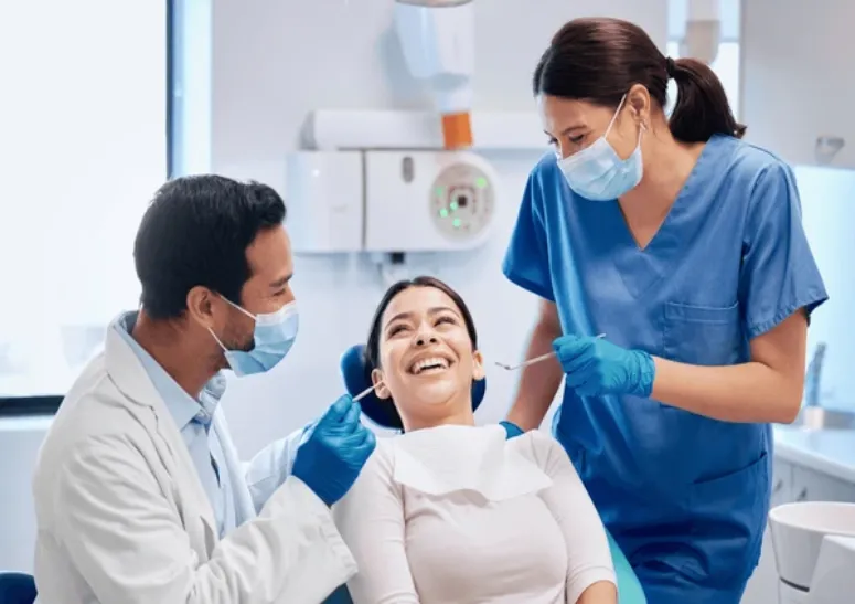 woman doctor dentist patient clinic 600nw 2475379775 (1)